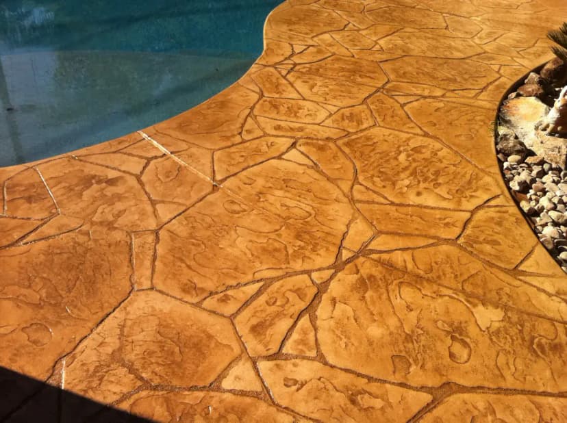 Close-up stone pattern pool deck edge