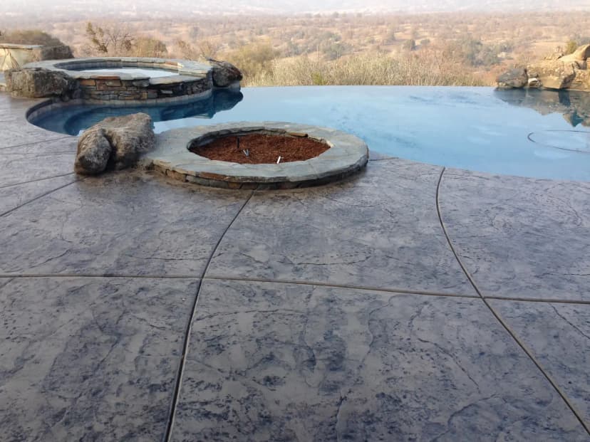 Pool with stamped concrete deck