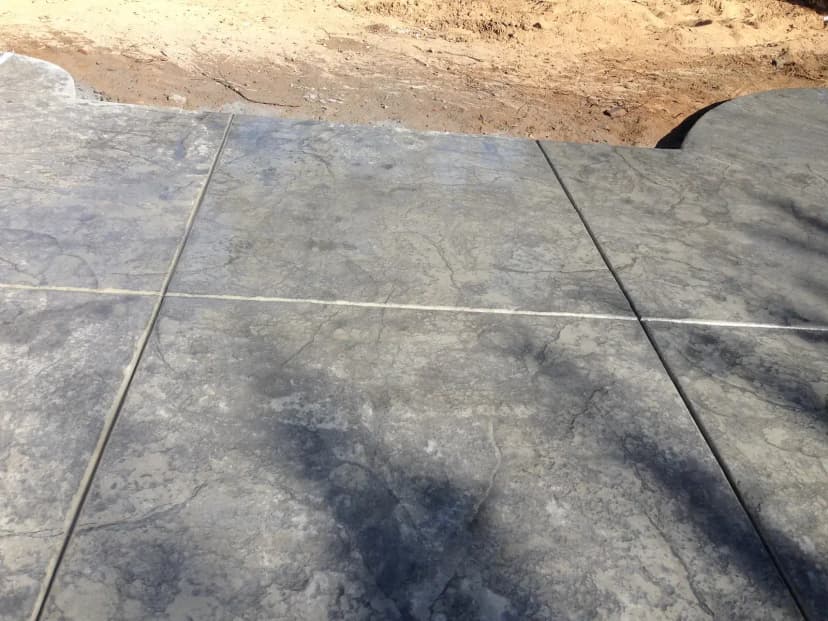 Close-up of decorative concrete with saw-cut joint patterns