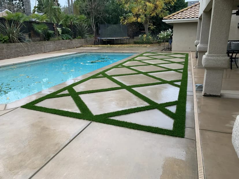 Concrete patio with decorative finish and fire pit feature