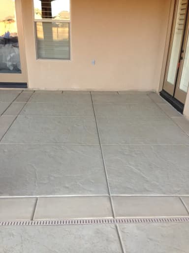 Interior concrete patio floor with decorative scoring