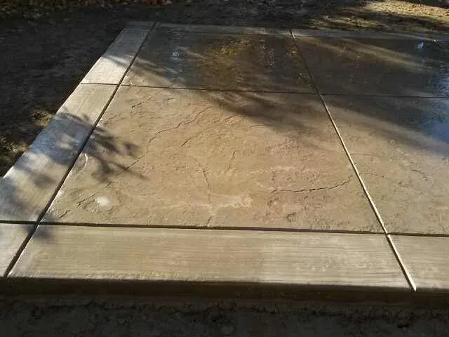 Concrete with water stains and joint lines