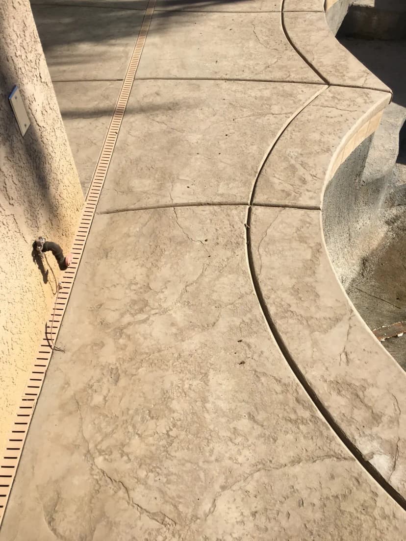 Stamped concrete surface with measurement scale
