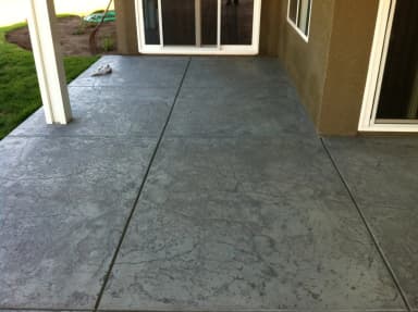 Finished patio with stamped pattern near house