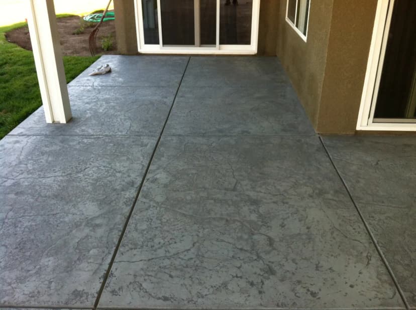 Finished patio with stamped pattern near house