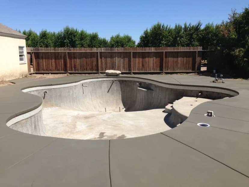Orange stained concrete with decorative finish