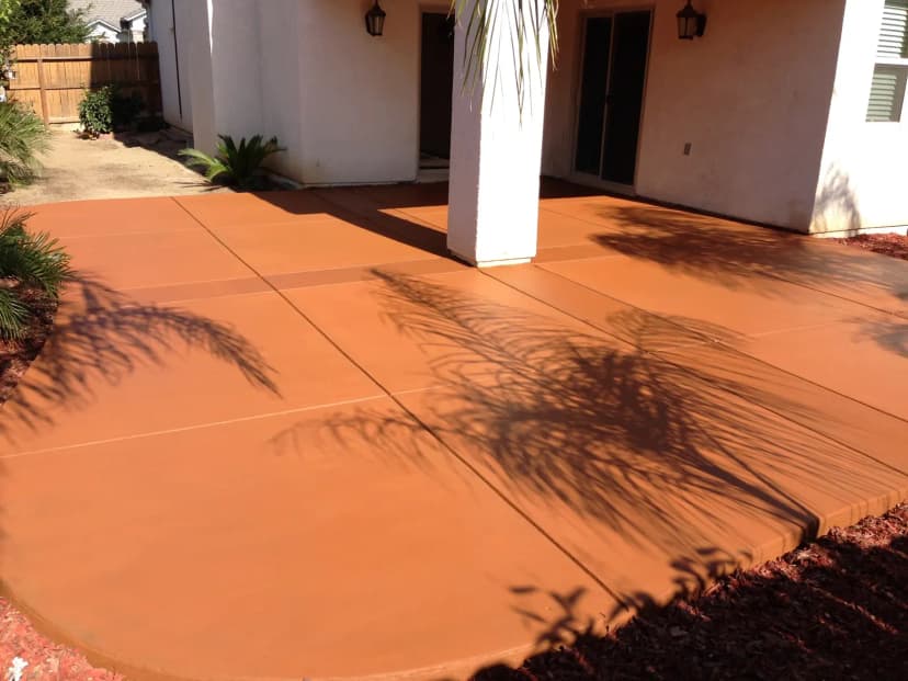 Finished pool and spa with decorative concrete