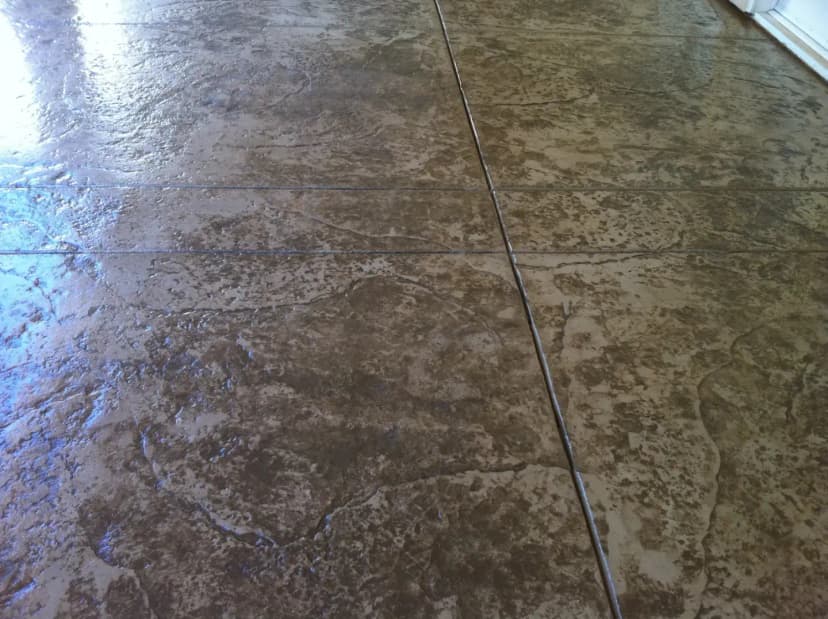 Stamped concrete with colored finish pattern