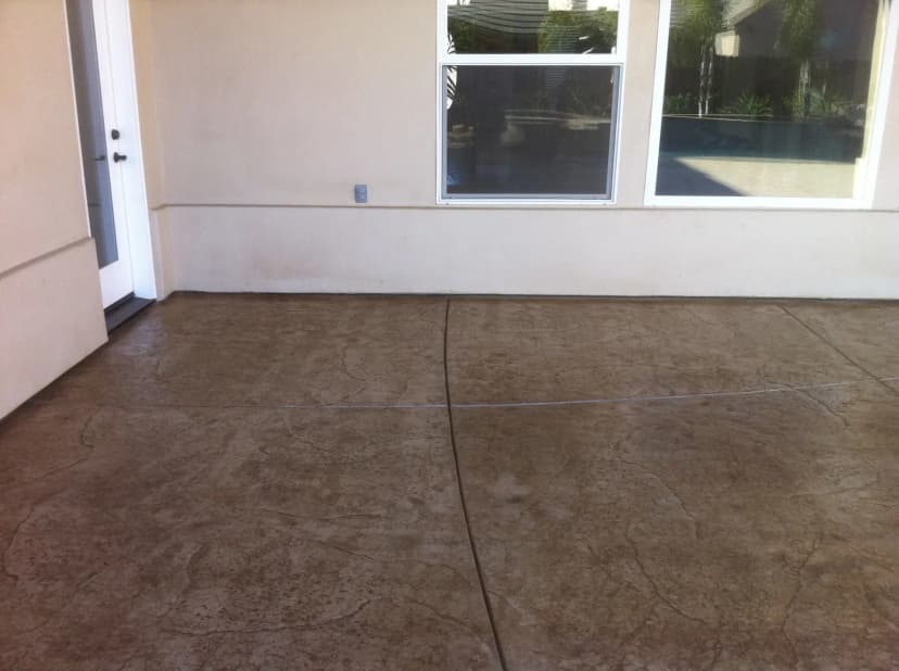 Indoor stained concrete floor with entryway