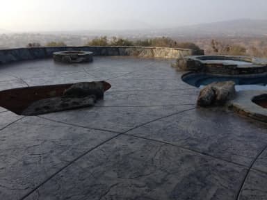 Stamped concrete landscape with fire features