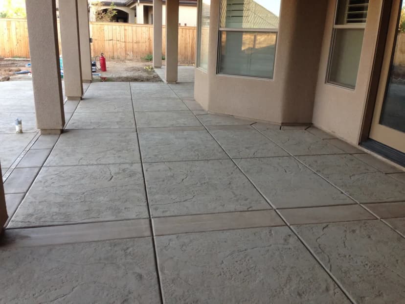 Covered patio with scored concrete walkway