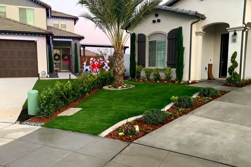 Front driveway with stamped concrete