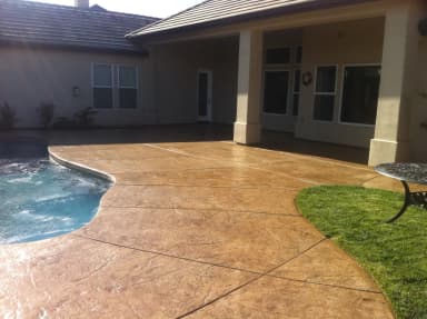 Patio with edge seating and stamped concrete