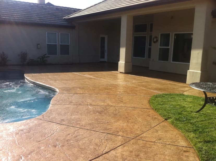 Patio with edge seating and stamped concrete