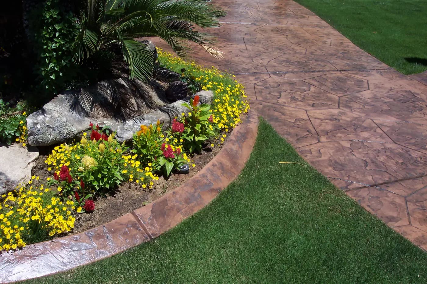 Wide view of a landscaped outdoor living space